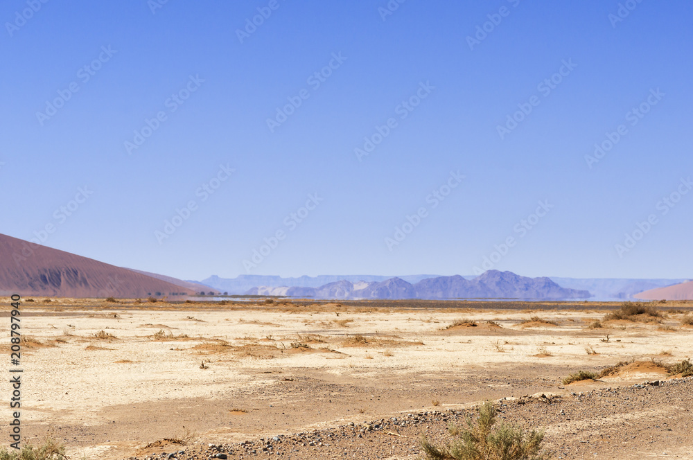 Landscape in the Namib Desert / Landscape in the Namib desert, the water on the horizon is a mirage Namibia, Africa. Landscape in the Namib Desert / Landscape in the Namib desert, the water on the horizon is a mirage Namibia, Africa.