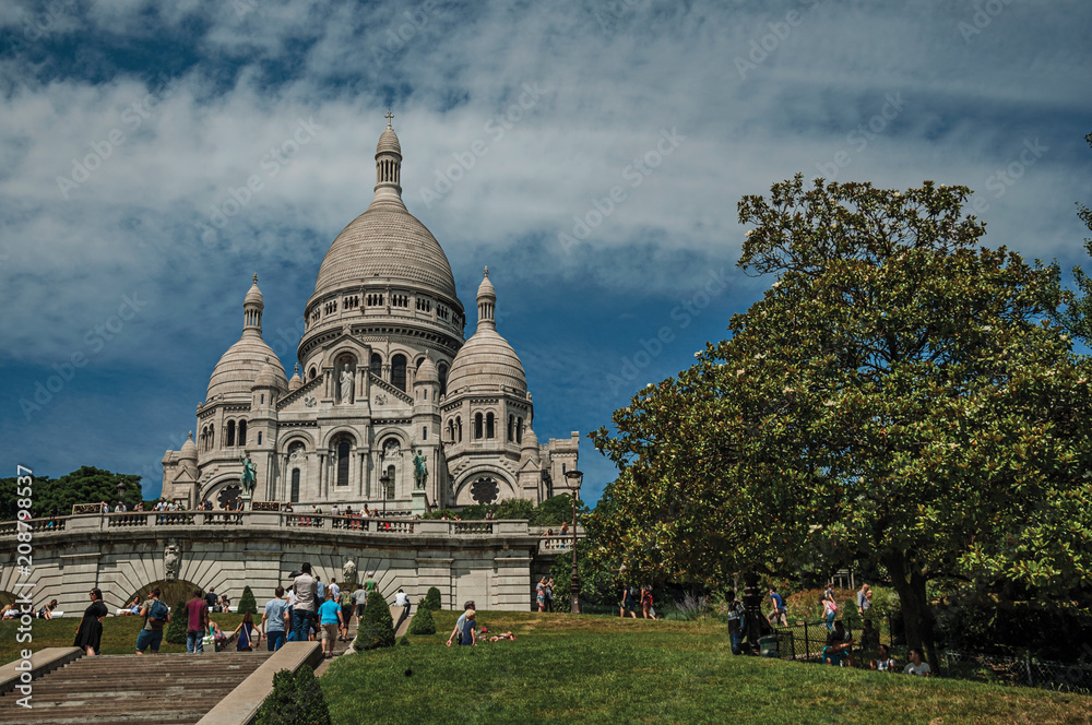 People, staircase and Basilica of Sacre Coeur at Montmartre in Paris. Known as the “City of Light”, is one of the most awesome world’s cultural center. Northern France.