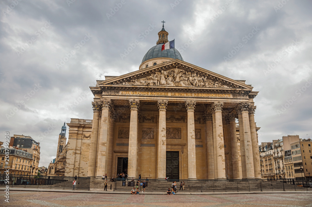 Obraz premium Facade of the Pantheon in Neoclassical style, with dome and columns at the entrance in Paris. Known as the “City of Light”, is one of the most impressive world’s cultural center. Northern France.