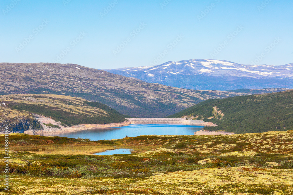 Lake Innerdalsvatnet and mountains Kvikne Bruna, located in the Rennebu district, Norway 