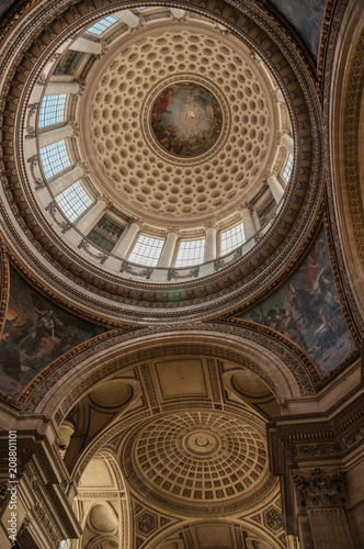 Inside view of the colorful and richly decorated Pantheon dome and ceiling in Paris. Known as one of the most impressive world   s cultural center. Northern France.