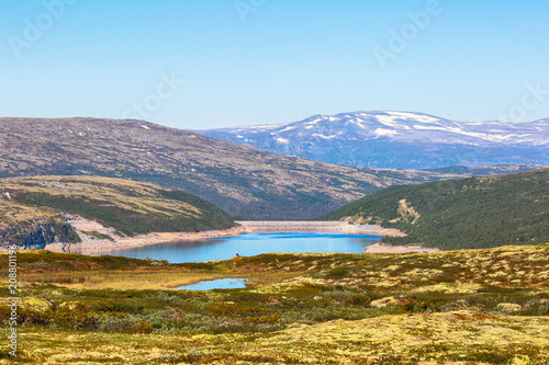 Lake Innerdalsvatnet and mountains Kvikne Bruna, located in the Rennebu district, Norway  photo