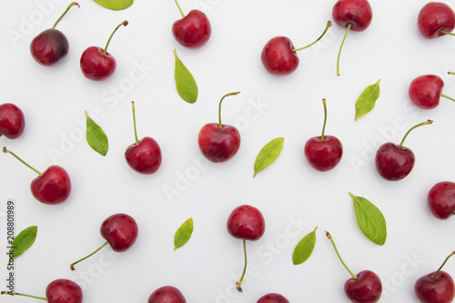 natural red cherries isolated in white background