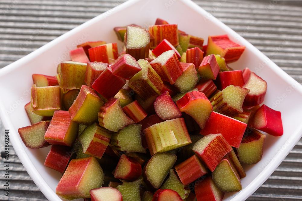 fresh rhubarb on a wooden rustic background fresh rhubarb on a wooden rustic background