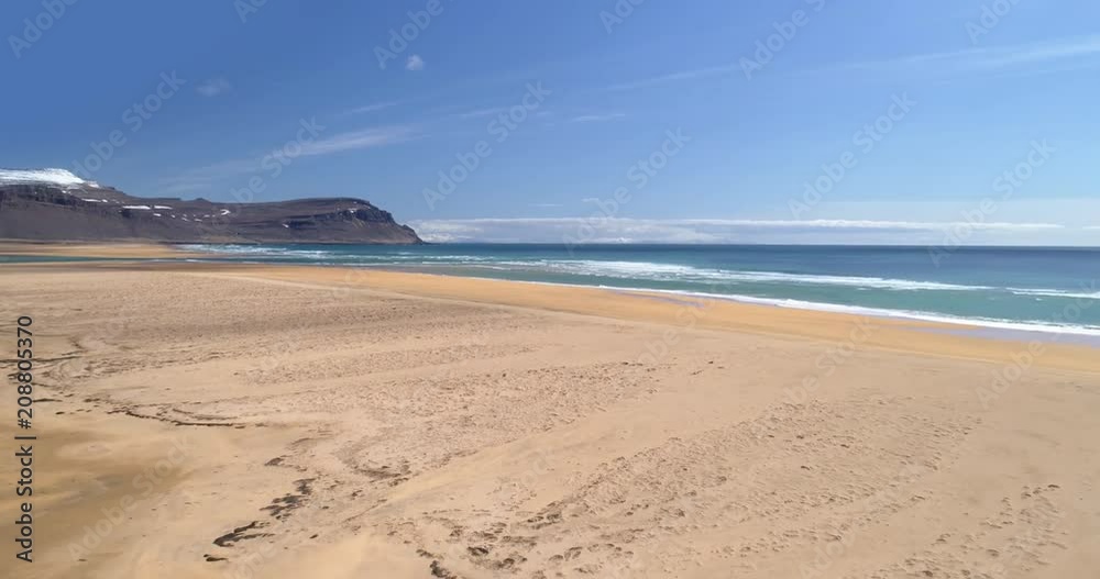Fying over picturesque desolate beach, drone hyperlapse Raudsandur west fjords Iceland. Fying over picturesque desolate beach, drone hyperlapse Raudsandur west fjords Iceland.
