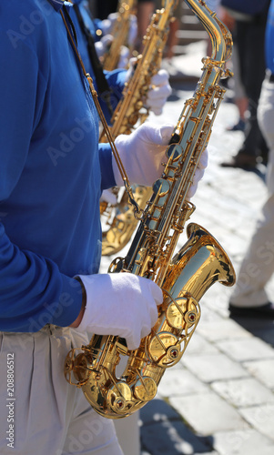 Music band and sax player suffer with gloves