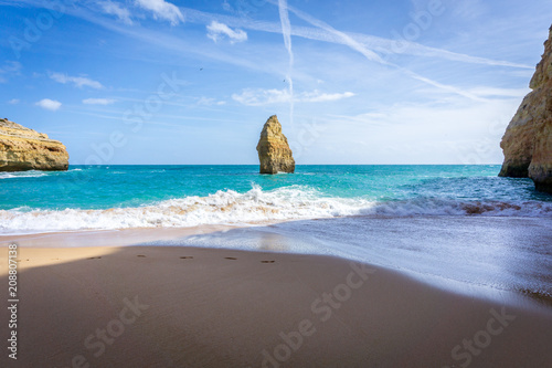 View of beautiful Marinha beach with crystal clear turquoise water near Carvoeiro town  Algarve region  Portugal