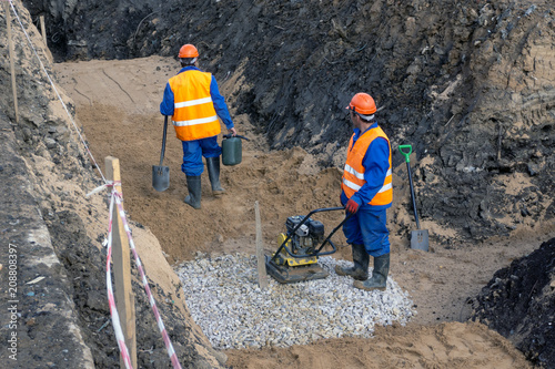 the worker is building a trench