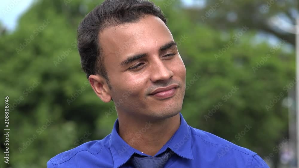 Pleasant Young Hispanic Business Man Relaxing Pleasant Young Hispanic Business Man Relaxing