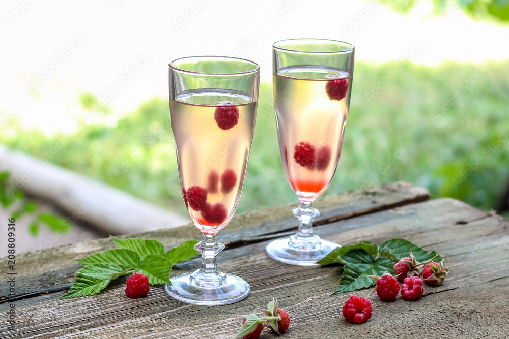 White wine with fresh raspberries. raspberry cocktail White wine with fresh raspberries. raspberry cocktail