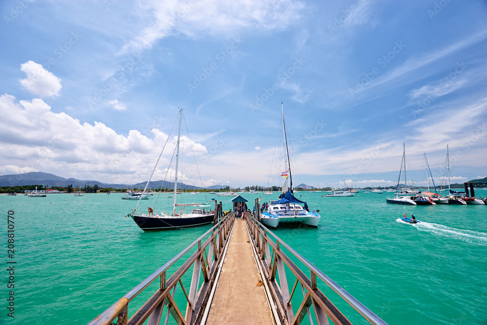 Fototapeta premium Travel by Thailand. Beautiful summer landscape with tropical sea marina lagoon and pier.