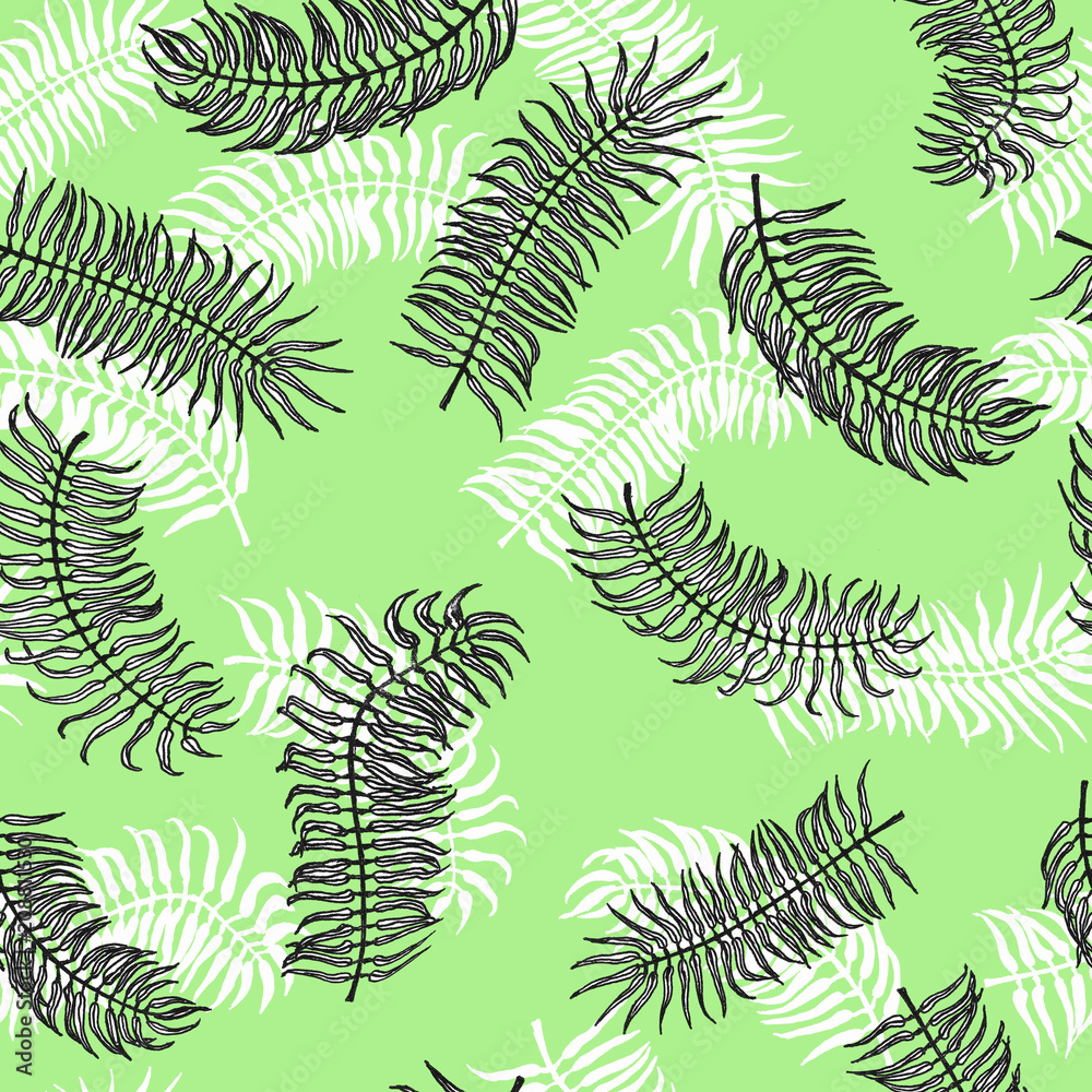 Seamless tropical pattern. Palm leaves on the green background