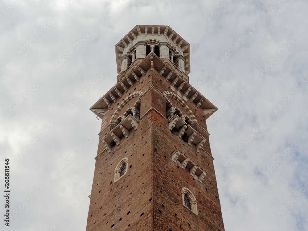 View up to the top of renaissance tower on cloudy sky