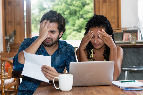 Latin american couple without money photo