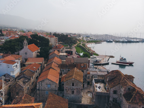 Drone shot of the Kastel old town on the coast of Dalmatia,Croatia . A famous tourist destination on the Adriatic sea.