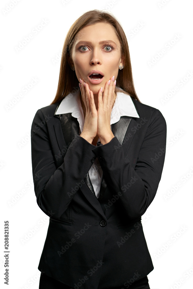 Wow! Shock! Amazed young business woman in black suit. Isolated on white. Wow! Shock! Amazed young business woman in black suit. Isolated on white.