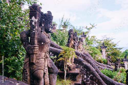 Traditional Balinese stone sculpture art and culture at Bali, Indonesia.