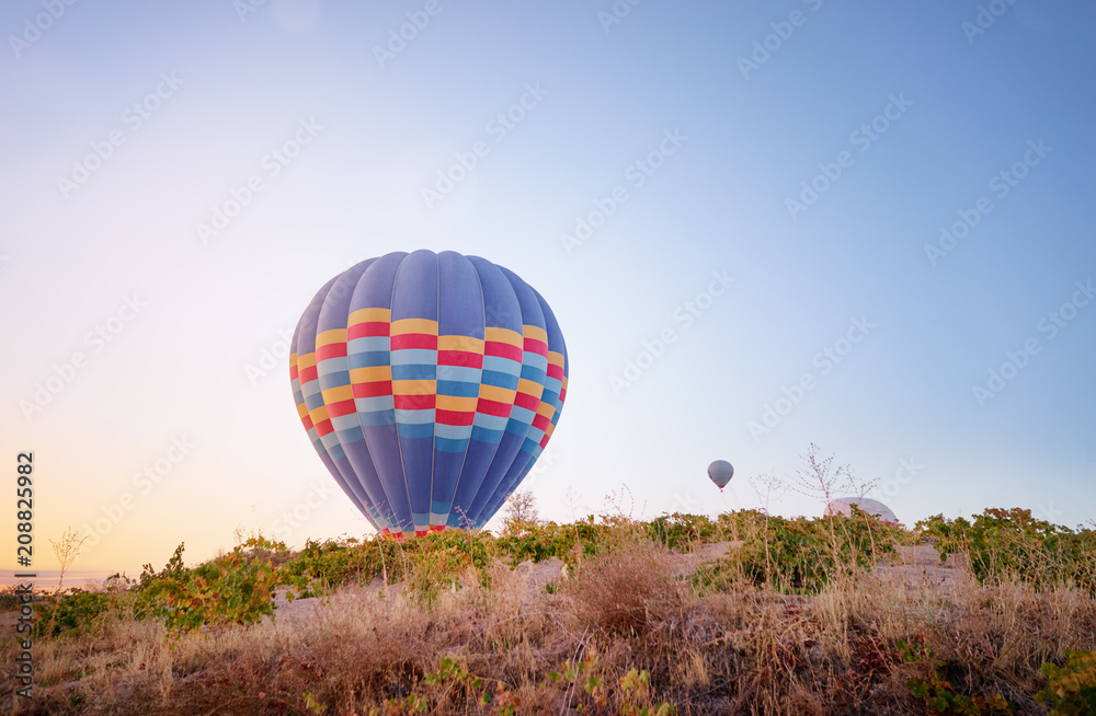 Travel and tourism by Turkey. Famous sightseeing Cappadocia, Anatolia. Baloons in the sky.