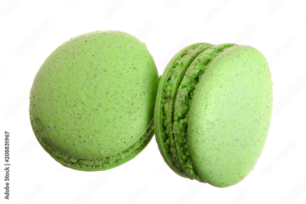 green macaroon isolated on white background without a shadow closeup. Top view. Flat lay green macaroon isolated on white background without a shadow closeup. Top view. Flat lay