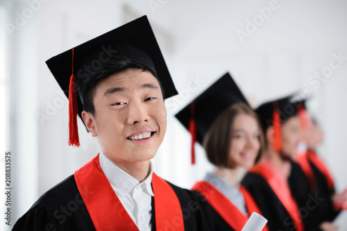 Student in bachelor robe in...