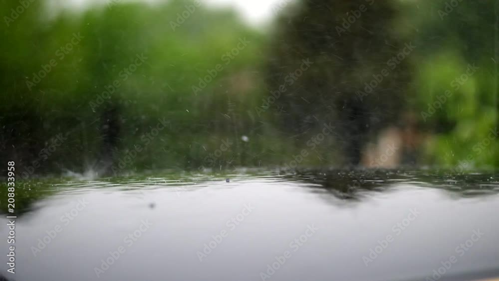 close up, there is heavy rain, shower, heavy drops fall with Water