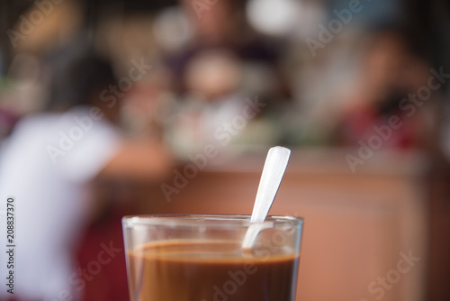 vintage coffee with a coffee shop on the background