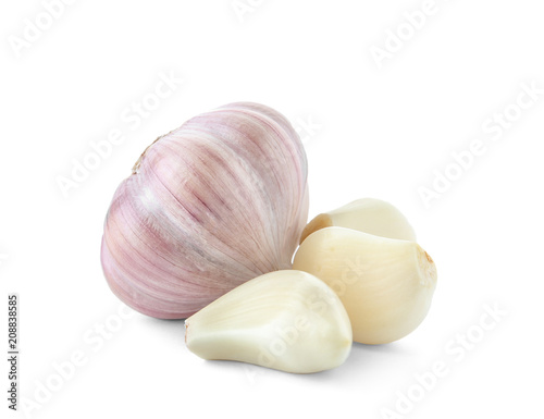 Fresh garlic bulb and cloves on white background