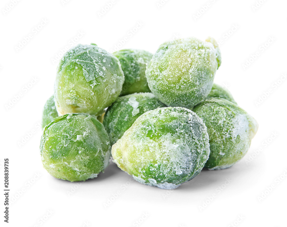 Frozen brussel sprouts on white background. Vegetable preservation Frozen brussel sprouts on white background. Vegetable preservation