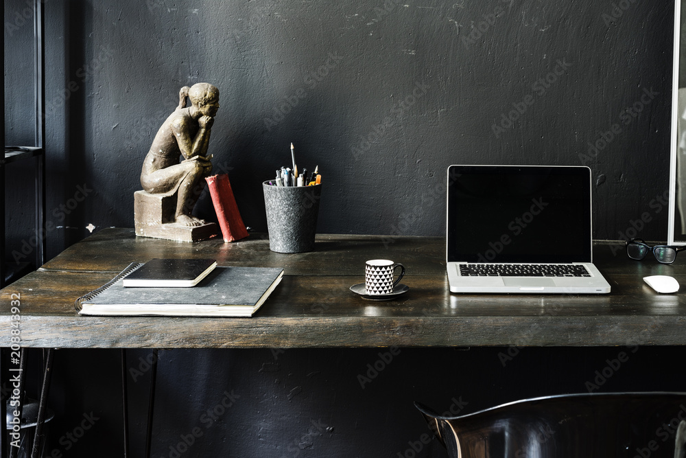 Dark home office with black walls Stock Photo | Adobe Stock