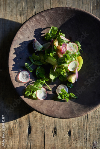 The bowl with the salad