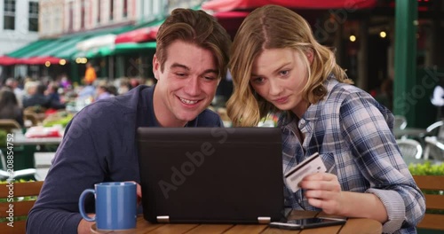Wallpaper Mural Happy Caucasian man and woman shopping online with laptop, Portrait of millennial couple using computer and credit card, 4k Torontodigital.ca