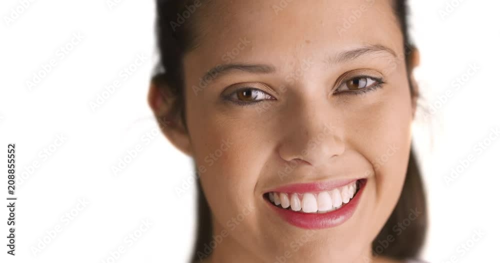 Close up of beautiful woman smiling at camera on white background, Portrait of Caucasian woman smiling and laughing in studio with copy space, 4k Close up of beautiful woman smiling at camera on white background, Portrait of Caucasian woman smiling and laughing in studio with copy space, 4k