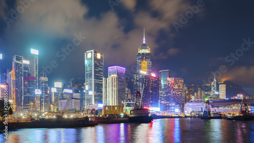 Victoria Harbor of Hong Kong City at night © leeyiutung