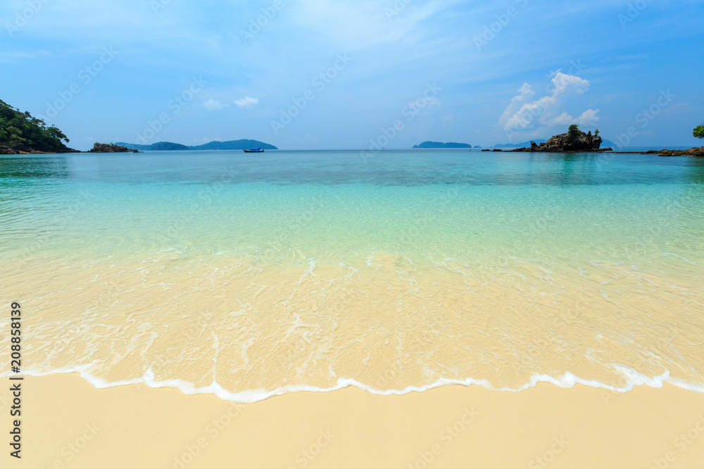 Bruer Island, amazing island from southern of Myanmar. A stunning seascape with turquoise water and white sand beach against blue sky at Bruer Island. Panoramic view