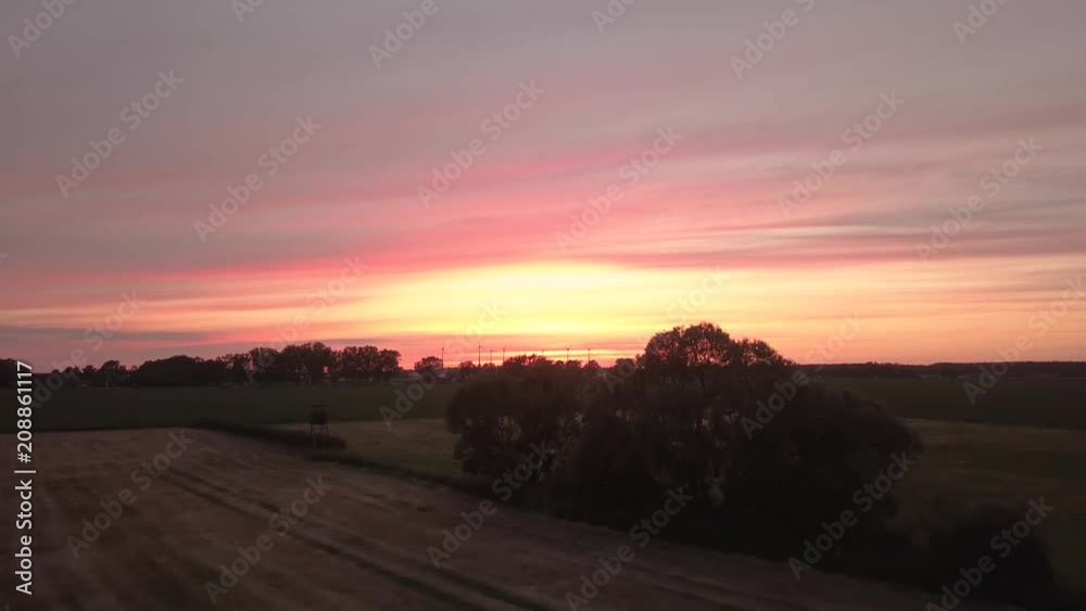 sunset over a summer landscape sunset over a summer landscape