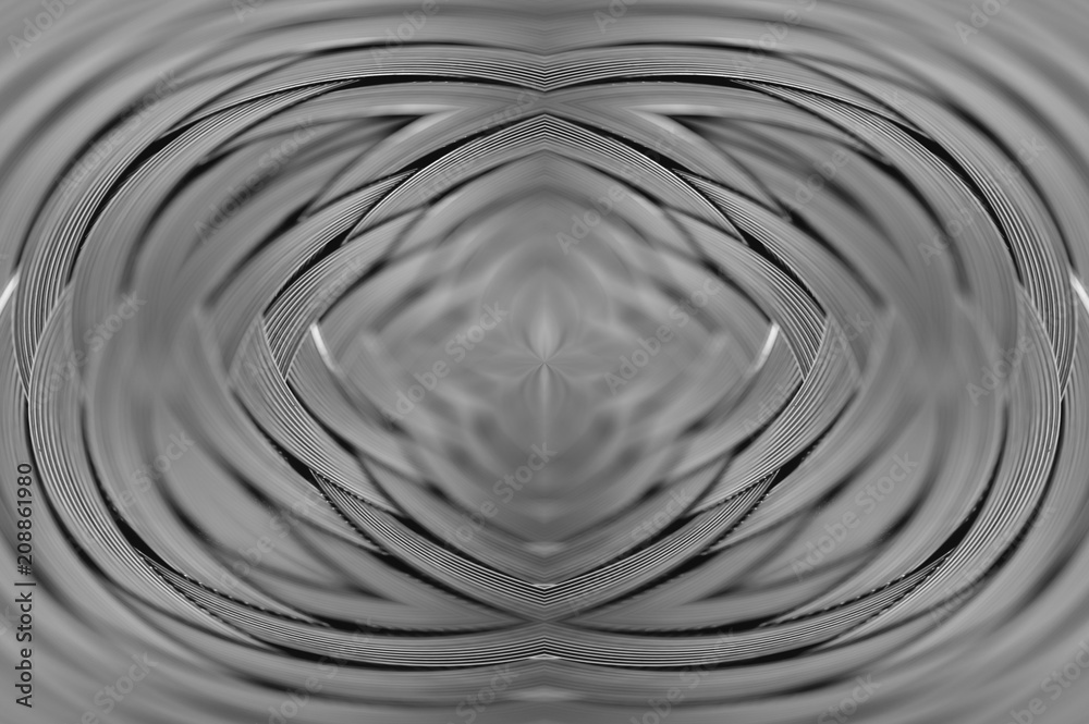 Symmetrical silver metallic wicker texture close-up. Detail background of volume steel surface. Abstract gray braided wire in macro. Surreal shape with copy space. Unusual black and white space. Symmetrical silver metallic wicker texture close-up. Detail background of volume steel surface. Abstract gray braided wire in macro. Surreal shape with copy space. Unusual black and white space.