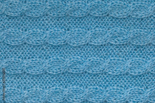 Tableau sur toile Light blue knitting texture with aran pattern, horizontal knit cable background