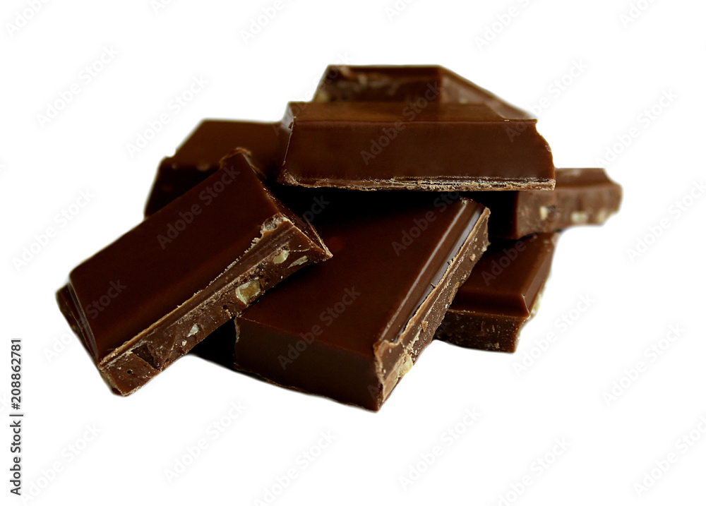 pieces of dark chocolate with nuts stacked in one pile pieces of dark chocolate with nuts stacked in one pile