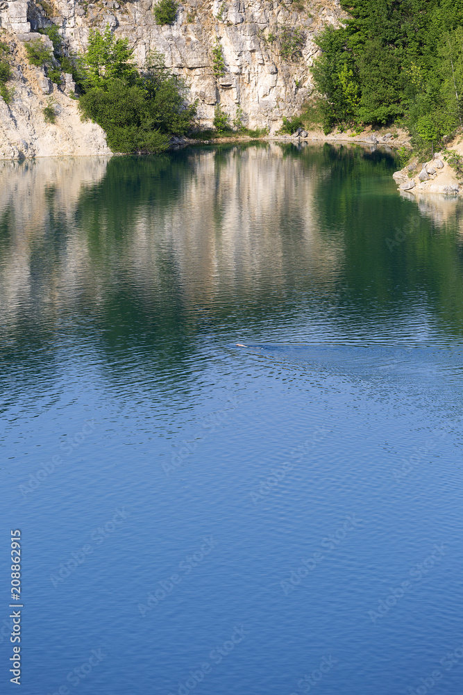 Lagoon Zakrzowek in an old limestone quarry, emerald water, beauty of nature, Krakow, Poland