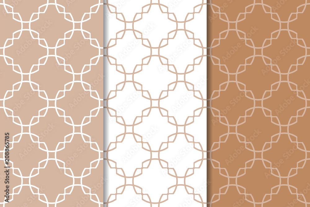 Fototapeta premium Set of geometric ornaments. Brown and white seamless patterns