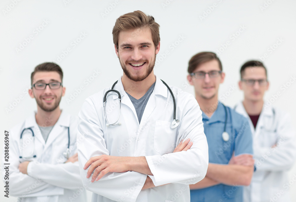 successful doctor in the background of the health care team successful doctor in the background of the health care team