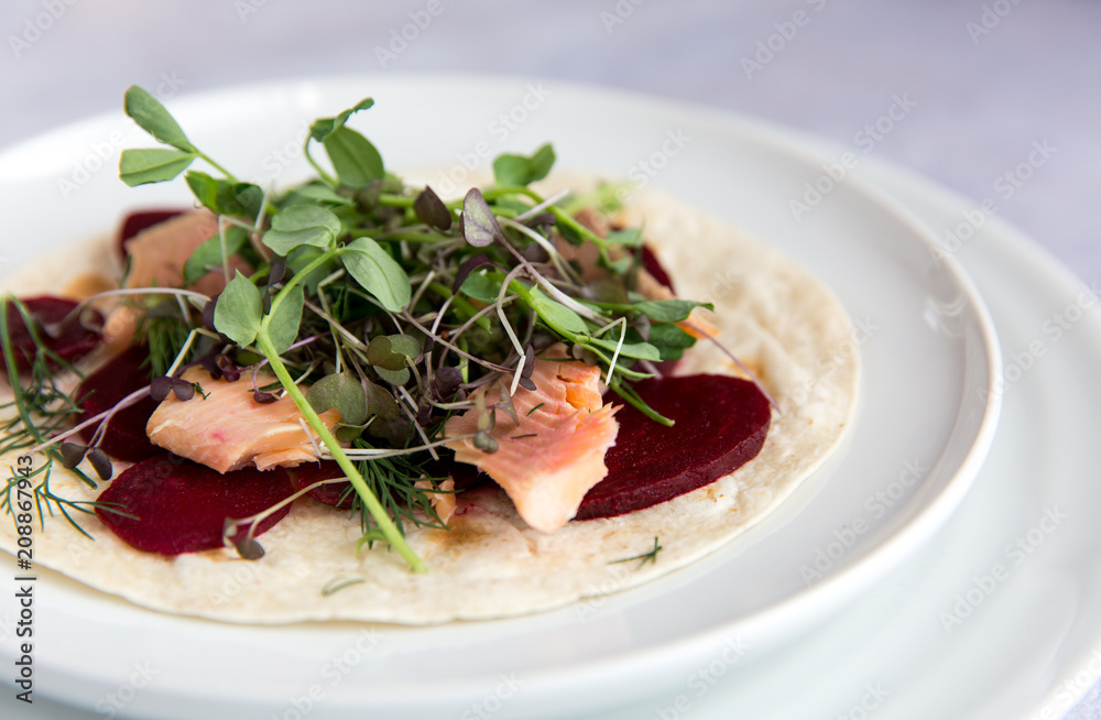 Smoked sea trout, beetroot and creme fraiche with flatbread. Smoked sea trout, beetroot and creme fraiche with flatbread.