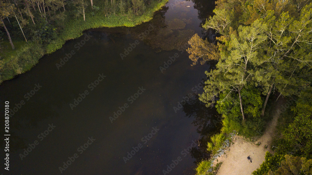 River snaking through a small urban suburb in Brisbane Australia River snaking through a small urban suburb in Brisbane Australia