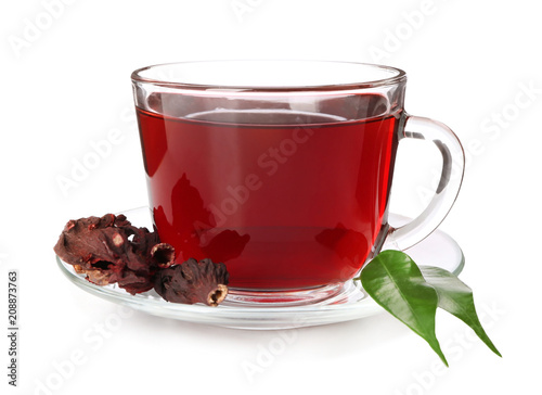 Cup of hot hibiscus tea on white background