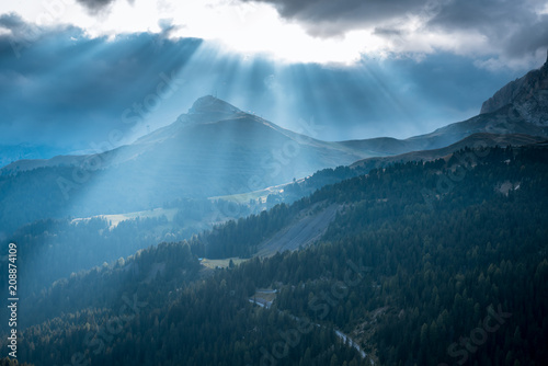 Sunrise silhouettes of Alps mountain and sunlight