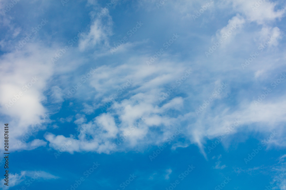 Clouds on a blue sky as a background