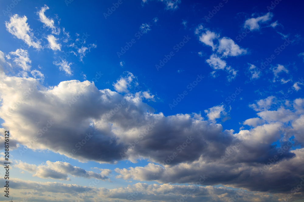 Clouds on a blue sky as a background Clouds on a blue sky as a background