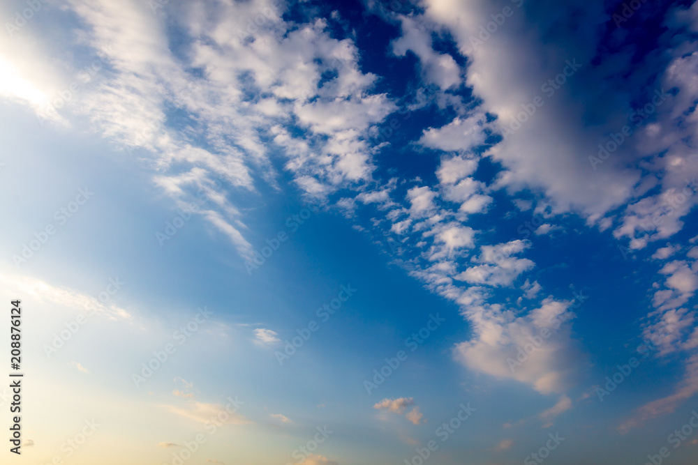 Fototapeta premium Clouds in the sky at sunset as background