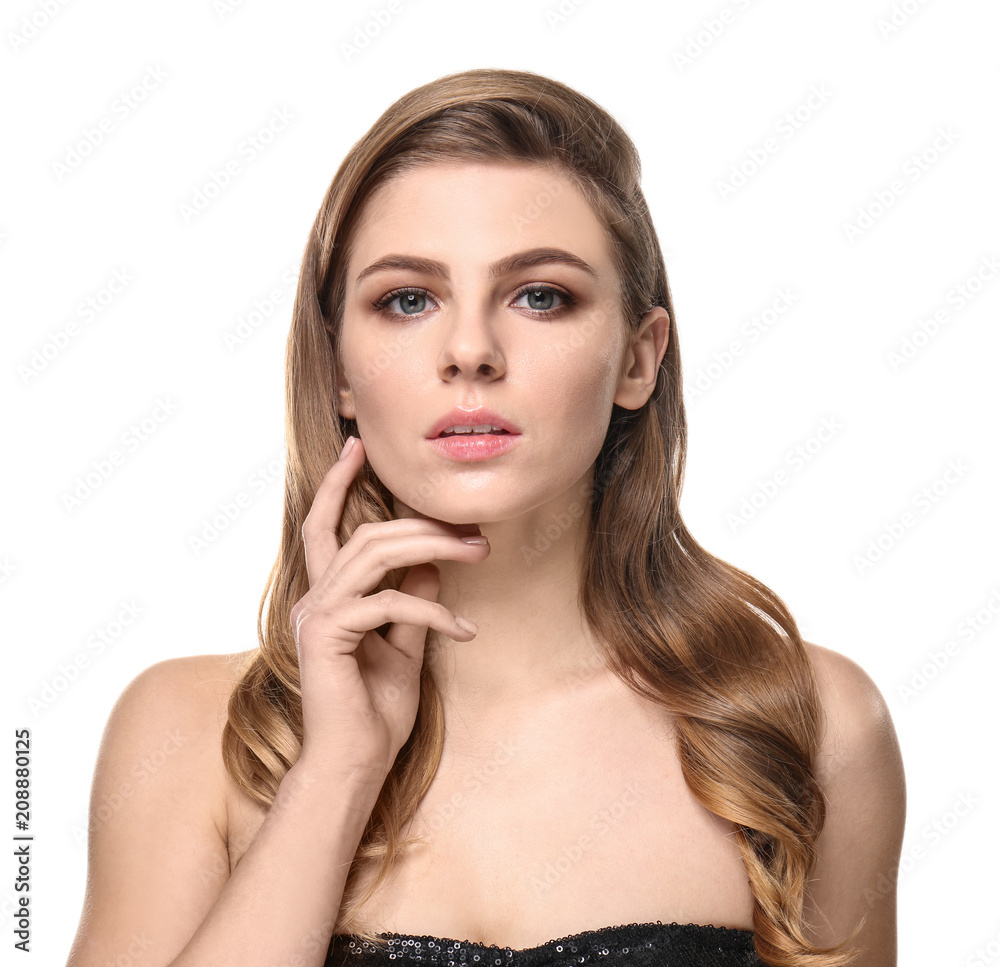 Portrait of young woman with beautiful makeup on white background. Professional cosmetics