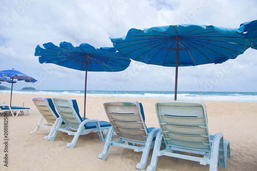 Chair with umbrella in beach summer holiday  © i am way